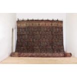 A very large Persian wool carpet,
