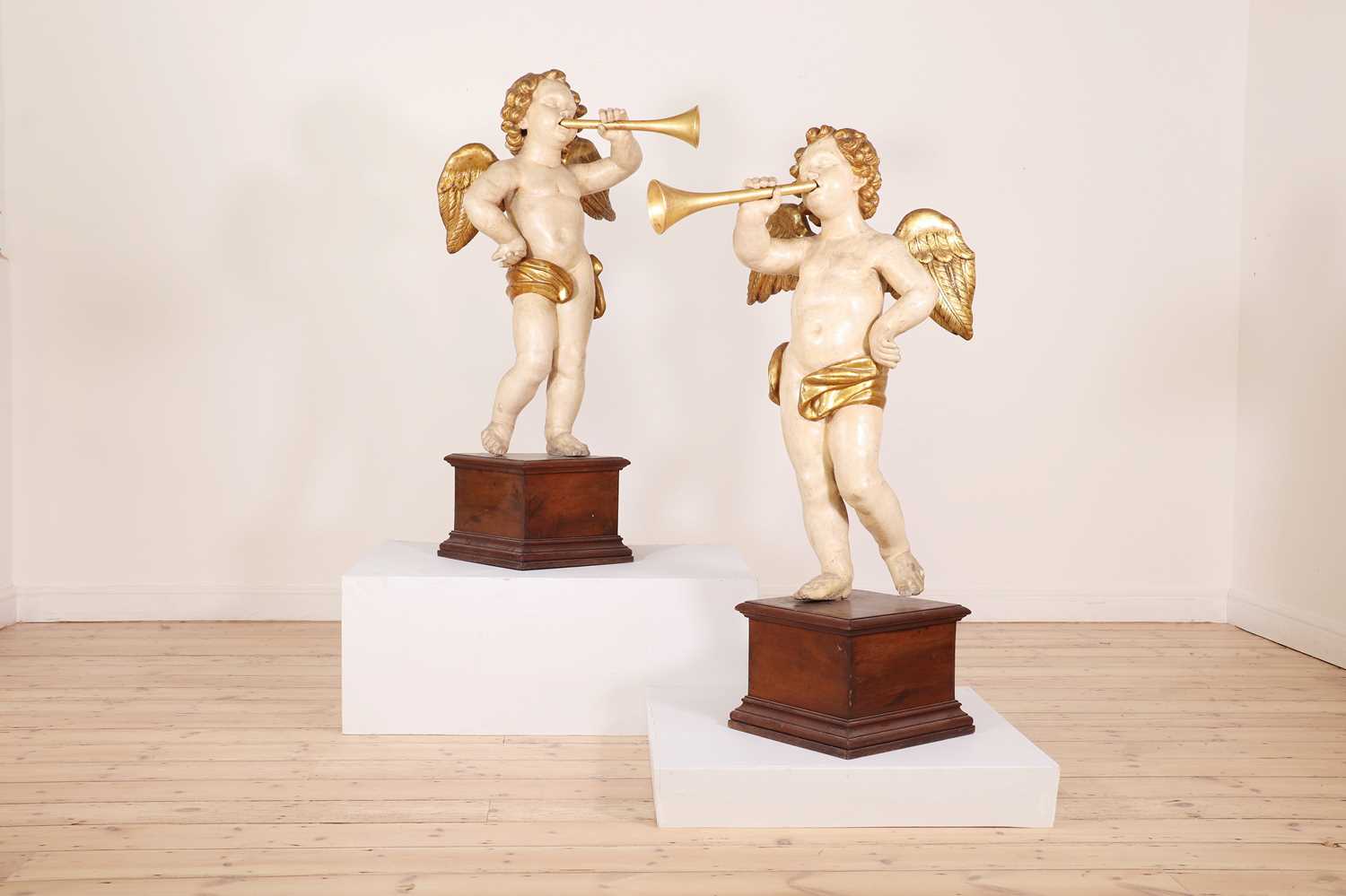A pair of painted and parcel-gilt wooden putti, - Image 3 of 23