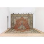 A Persian wool carpet,