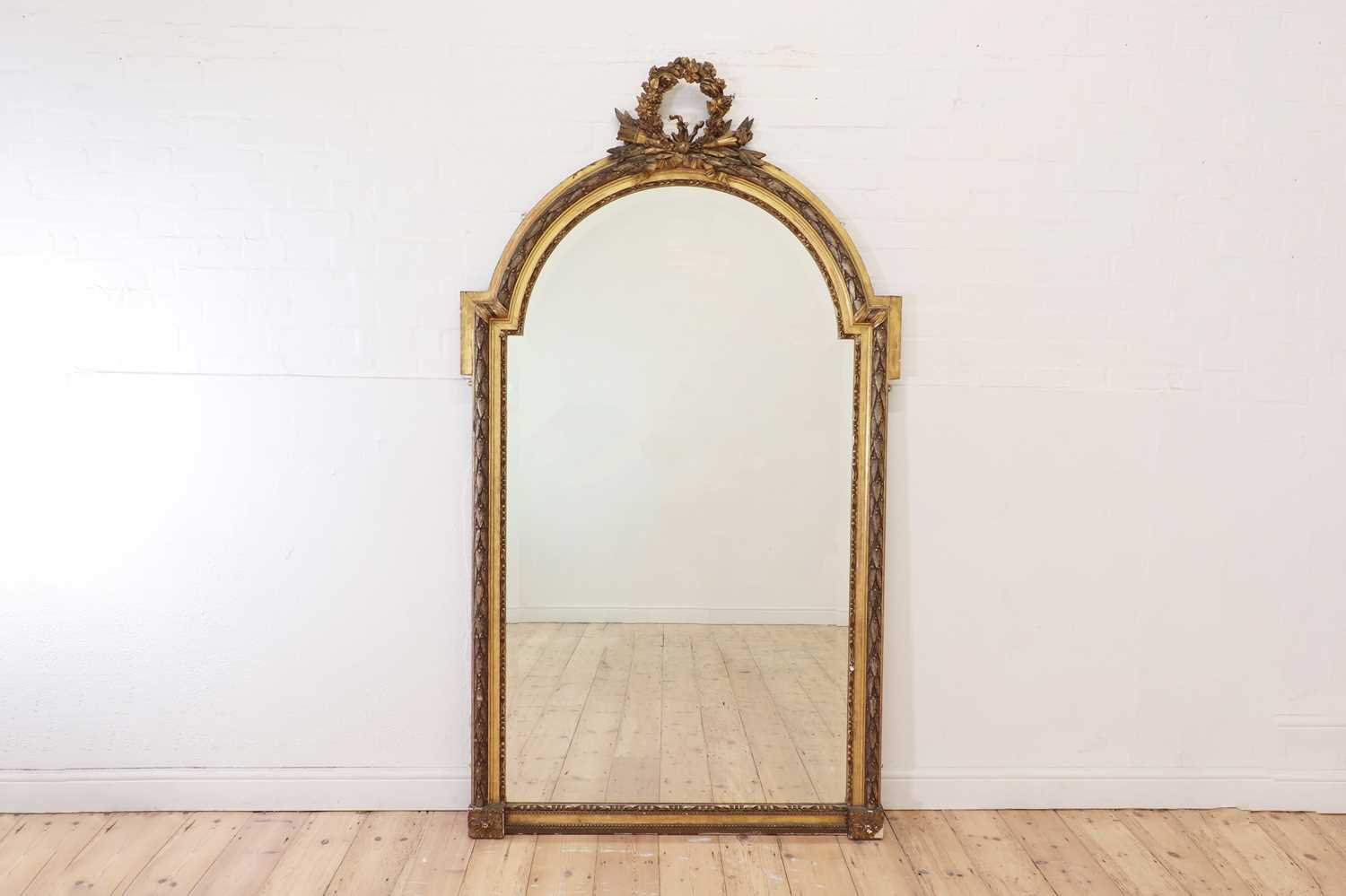 A Louis XVI-style giltwood and gesso overmantel mirror,