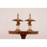 A pair of painted and giltwood table lamps,