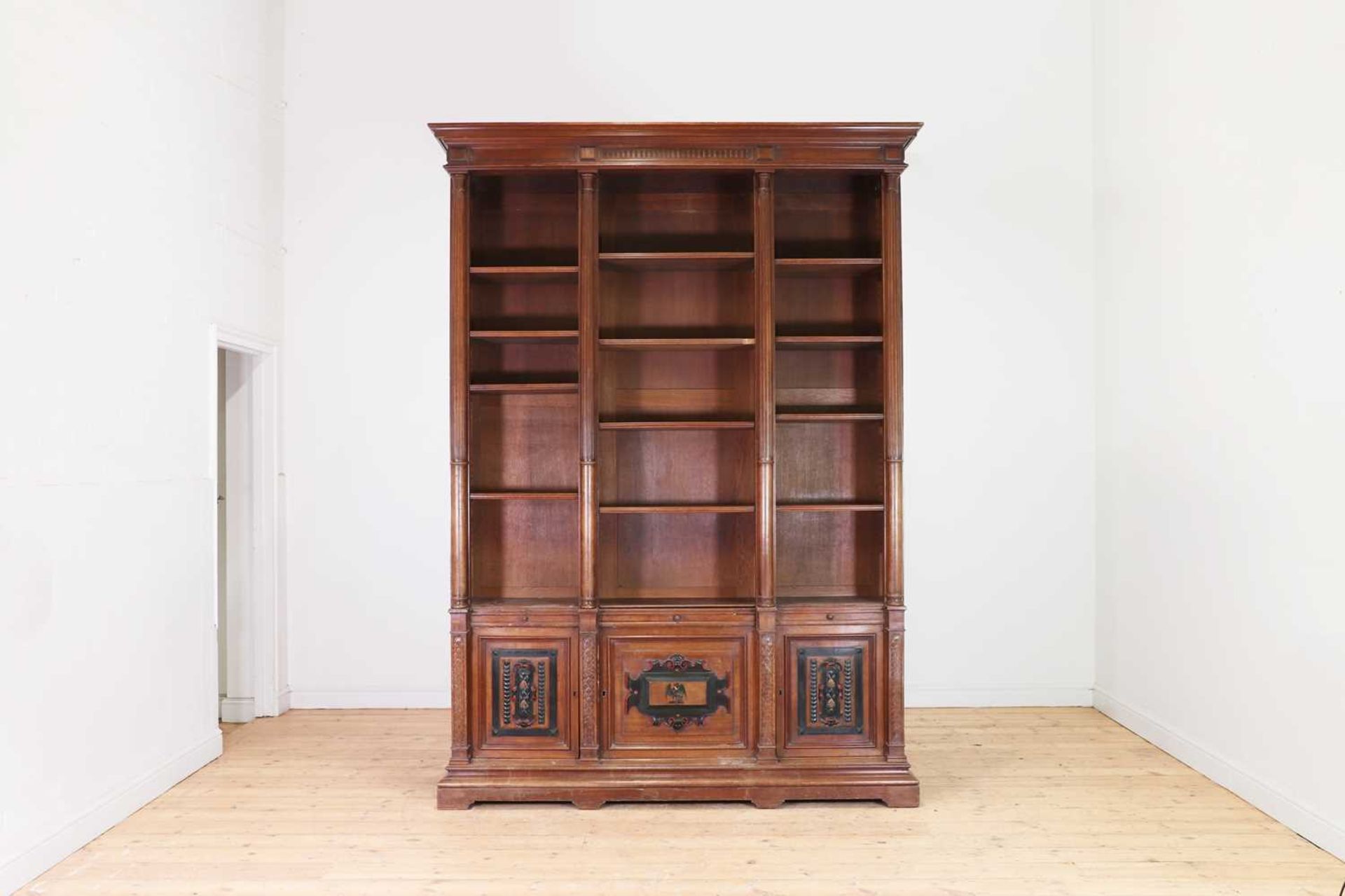 A walnut library bookcase,