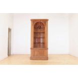 A George II-style pine standing corner cupboard,