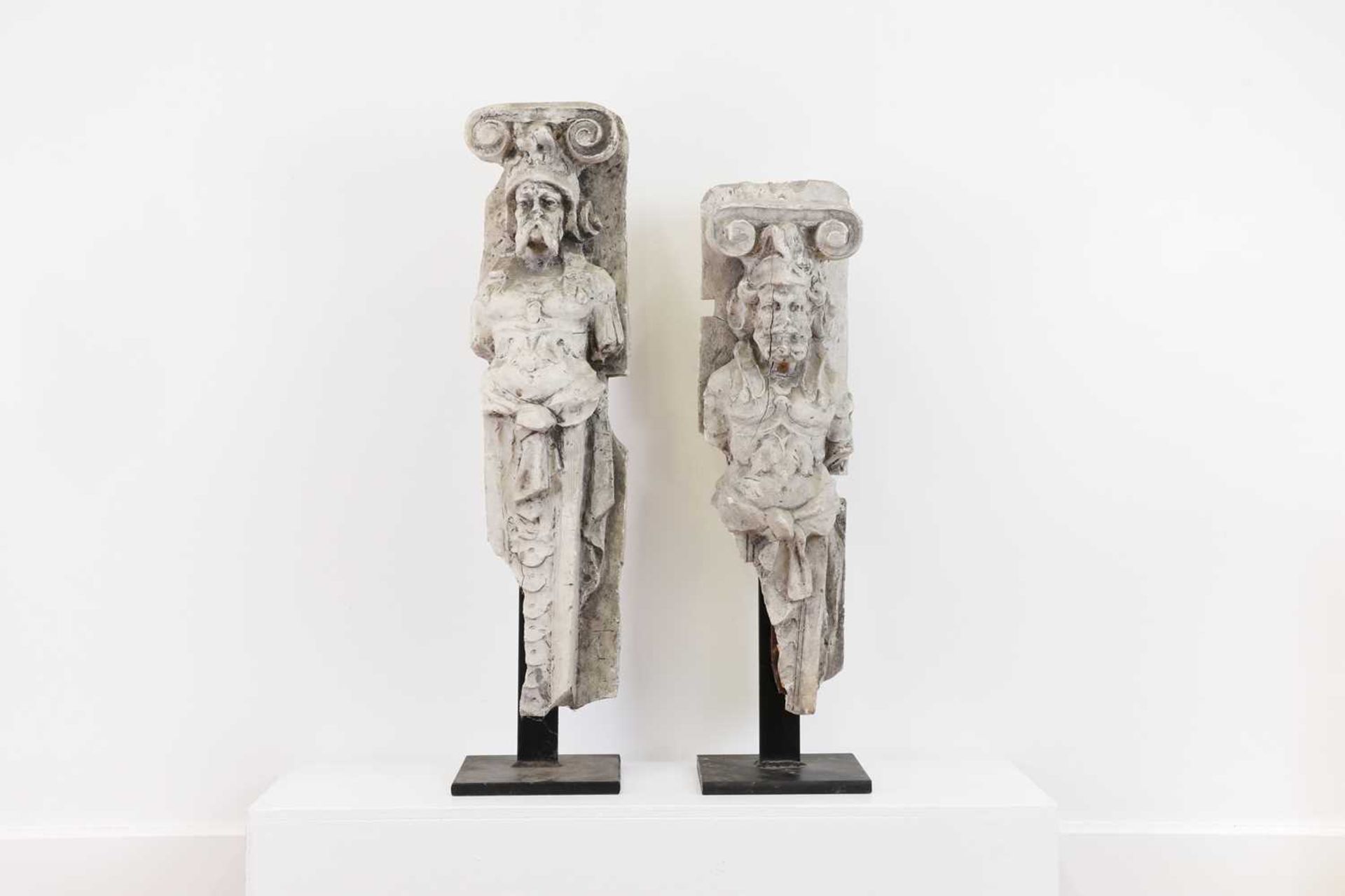 Two Renaissance-style plaster figural corbels,