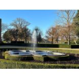 A granite garden water feature surround,