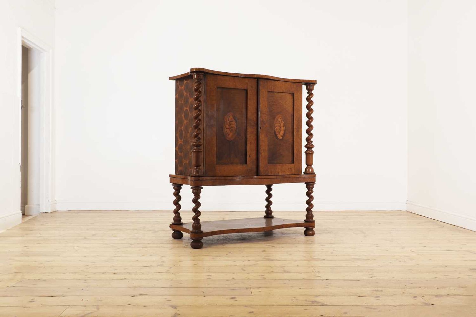 An oyster-veneered laburnum, maple and walnut collector's cabinet,