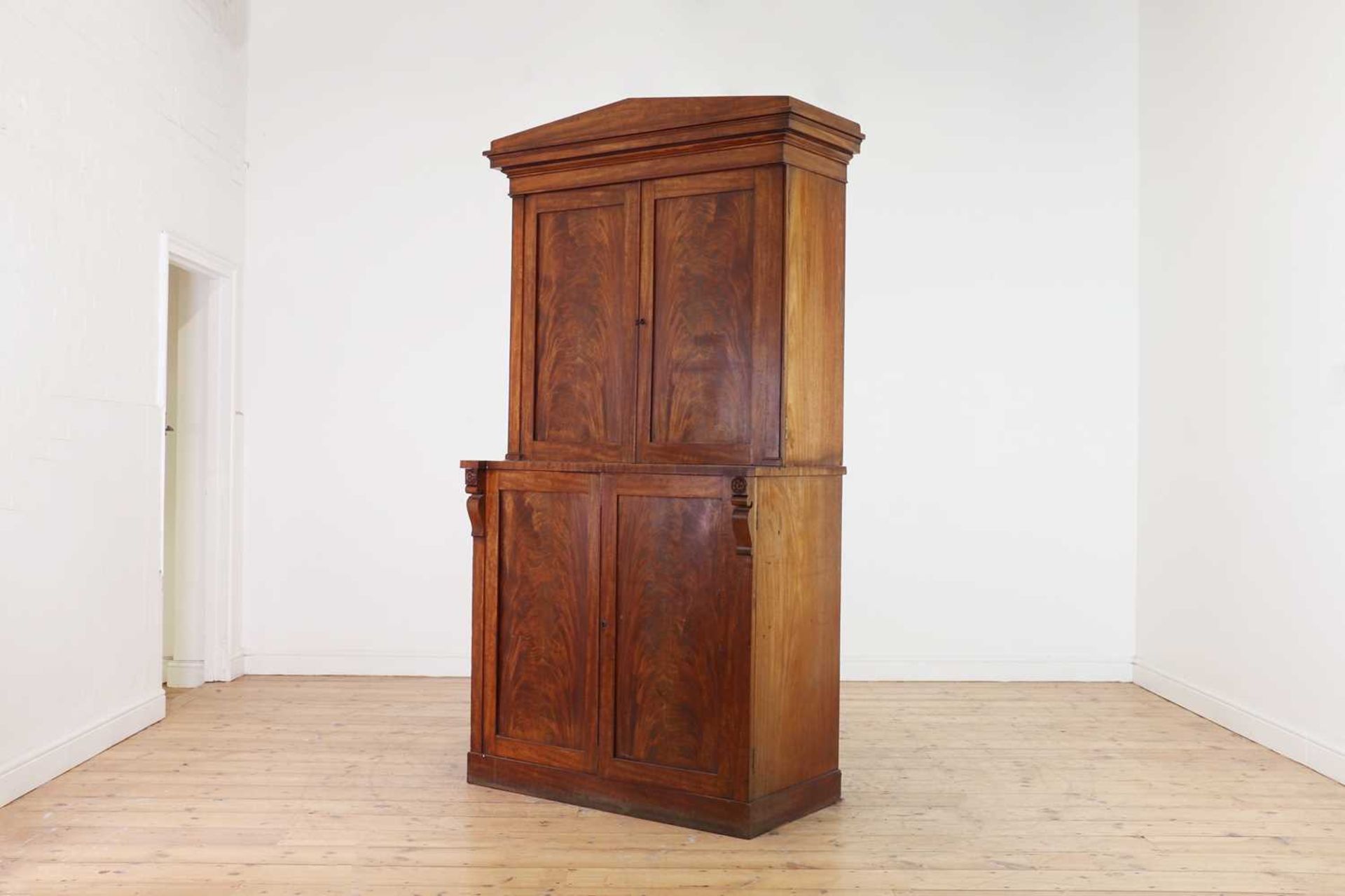 A George IV figured mahogany collector's cabinet,