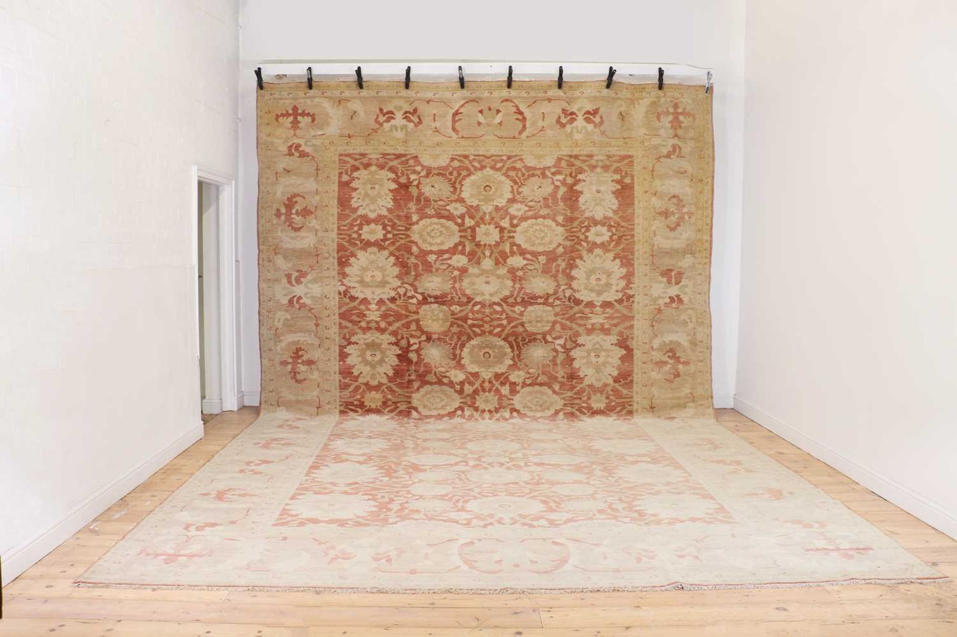 A large Persian Ziegler carpet