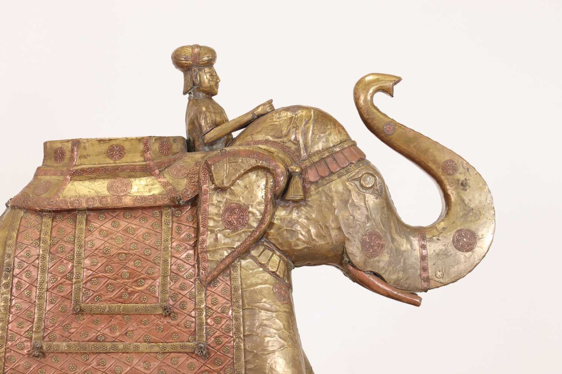 A large copper and brass-clad pull-along elephant, - Image 6 of 9