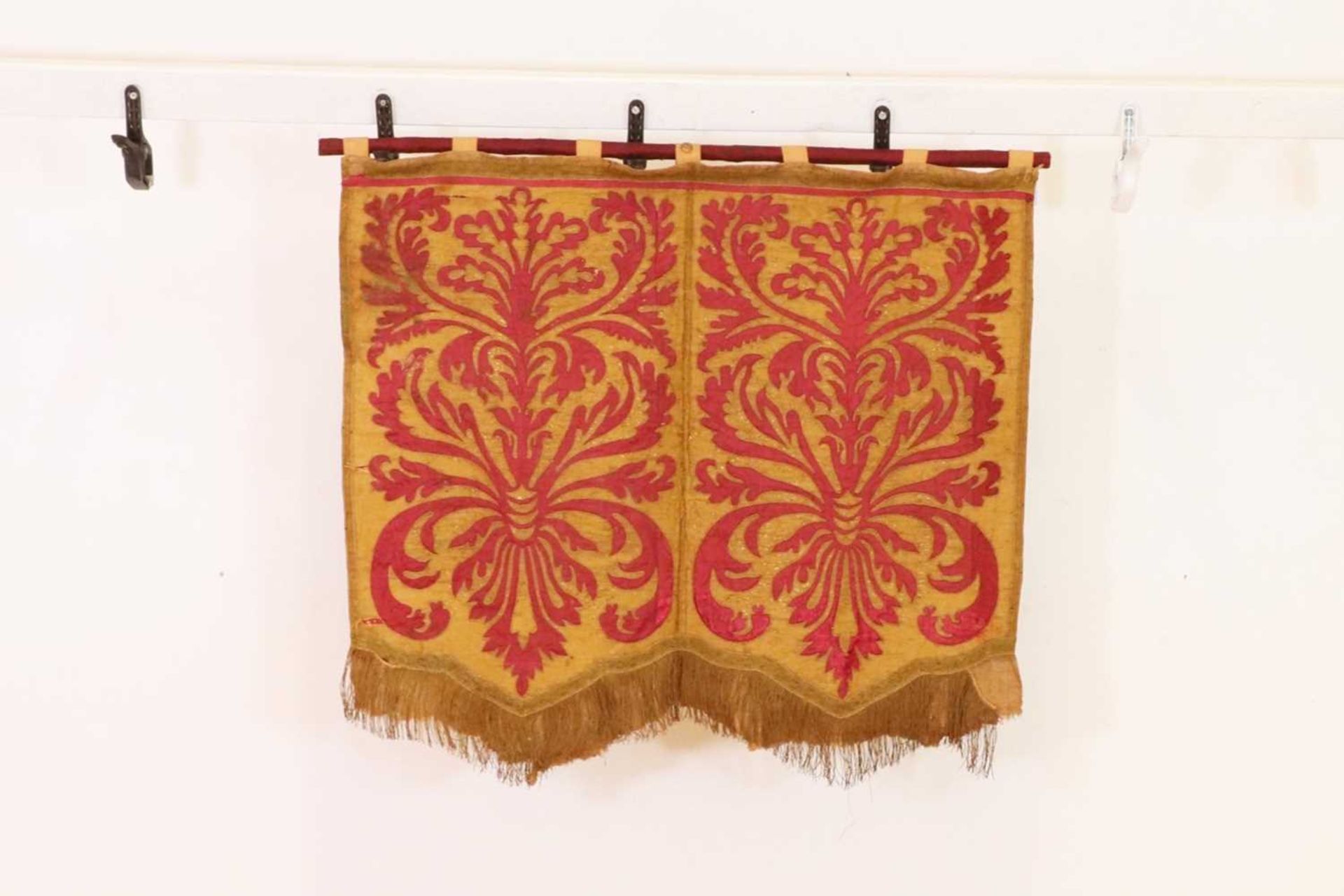 A silk and metal thread wall hanging,