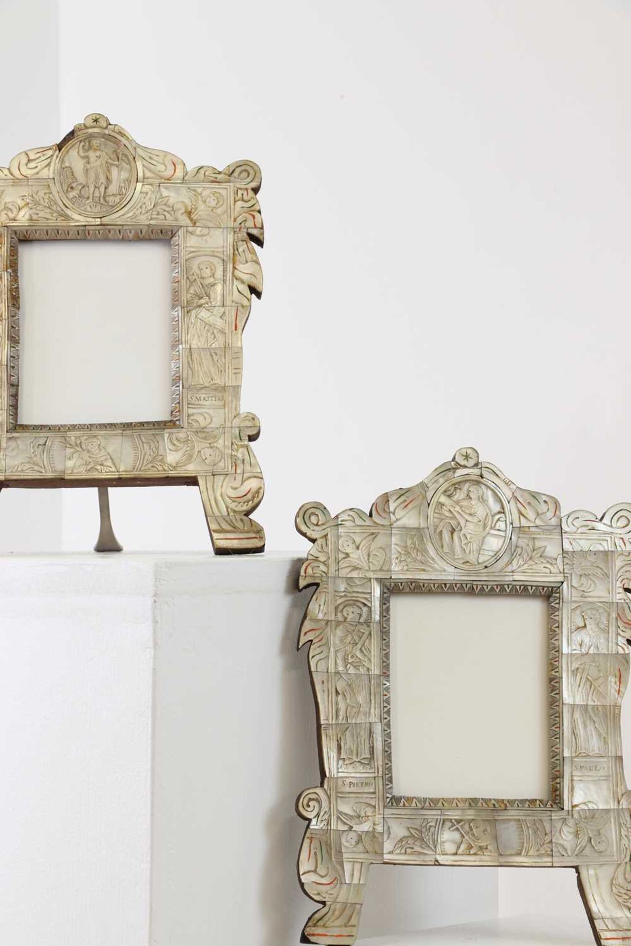 A pair of mother-of-pearl veneered devotional tabernacle frames,