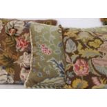 Four needlework cushions,