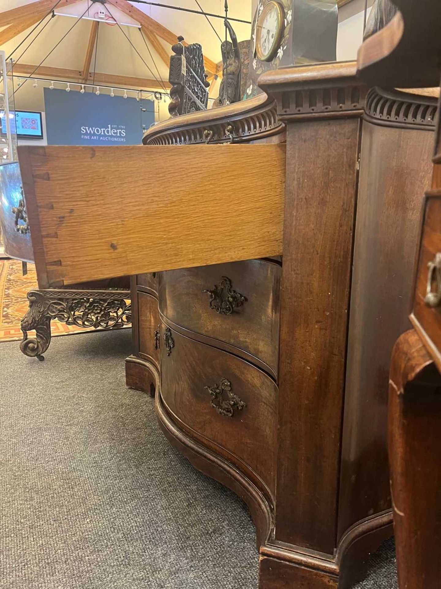 A George III mahogany serpentine commode, - Image 24 of 30