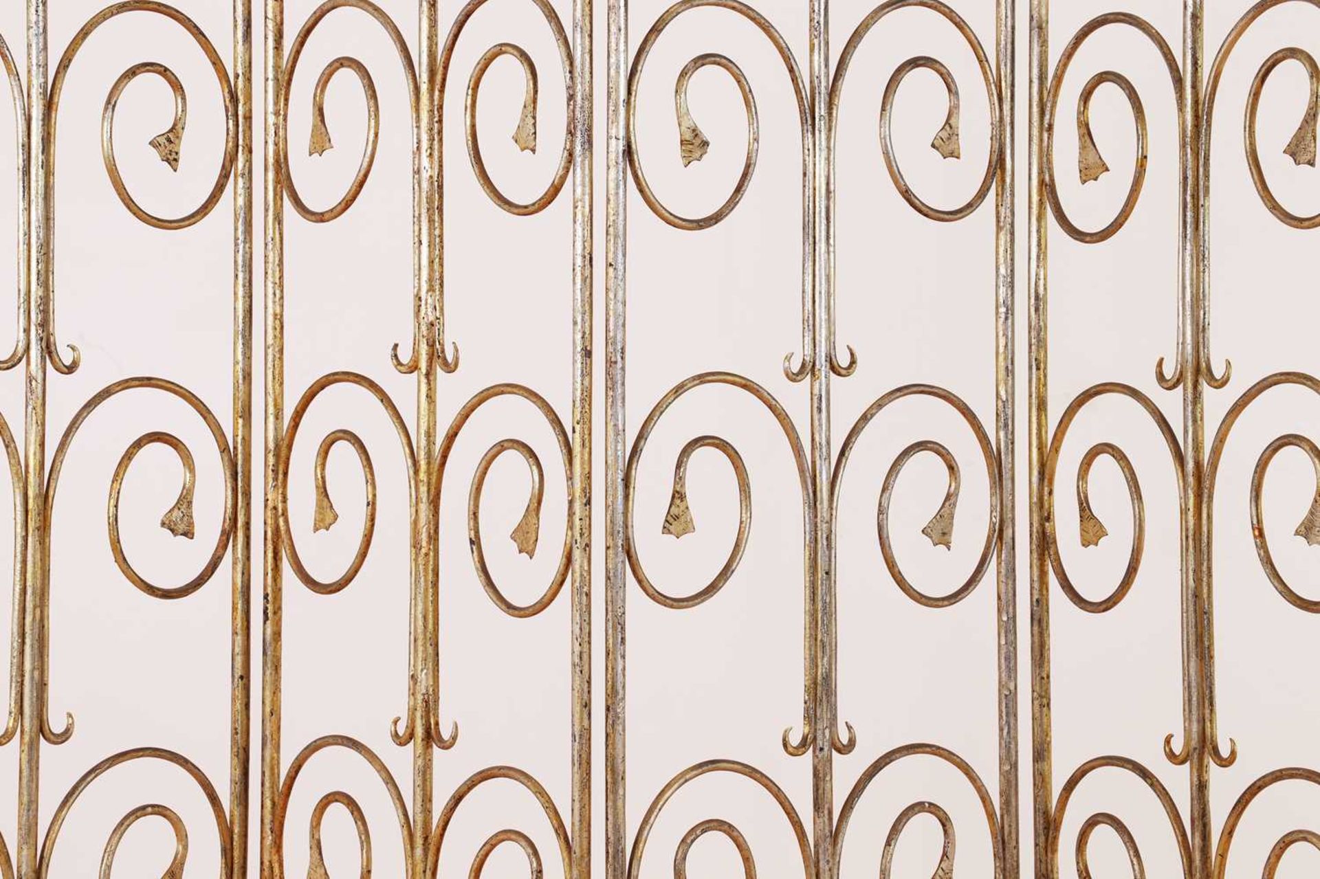 A wrought metal screen,