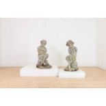 A pair of composition stone statues,