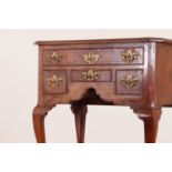 A walnut lowboy,