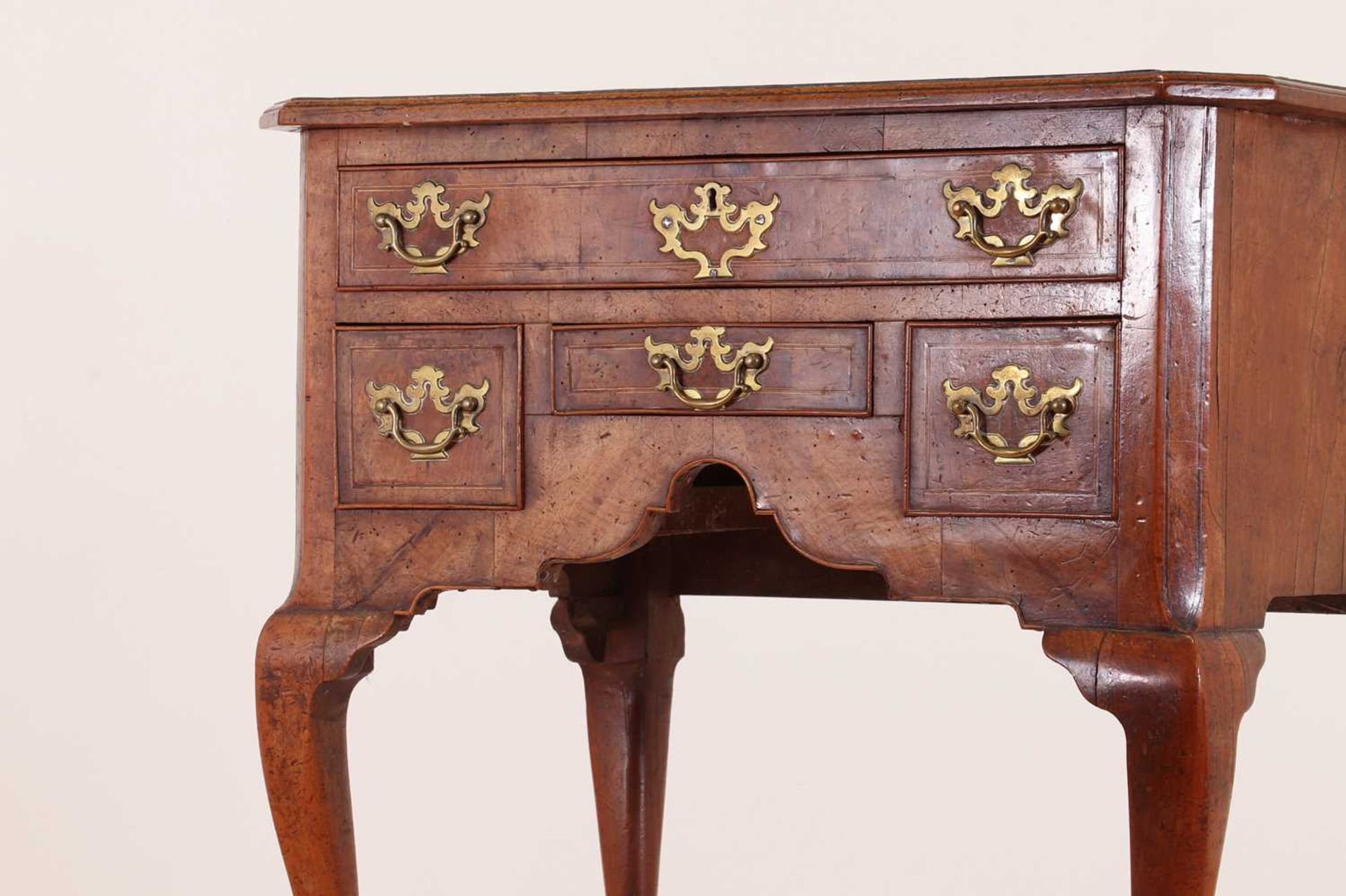 A walnut lowboy,