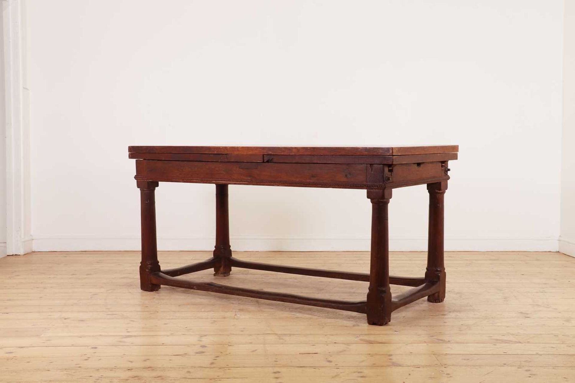 An oak draw-leaf refectory table,