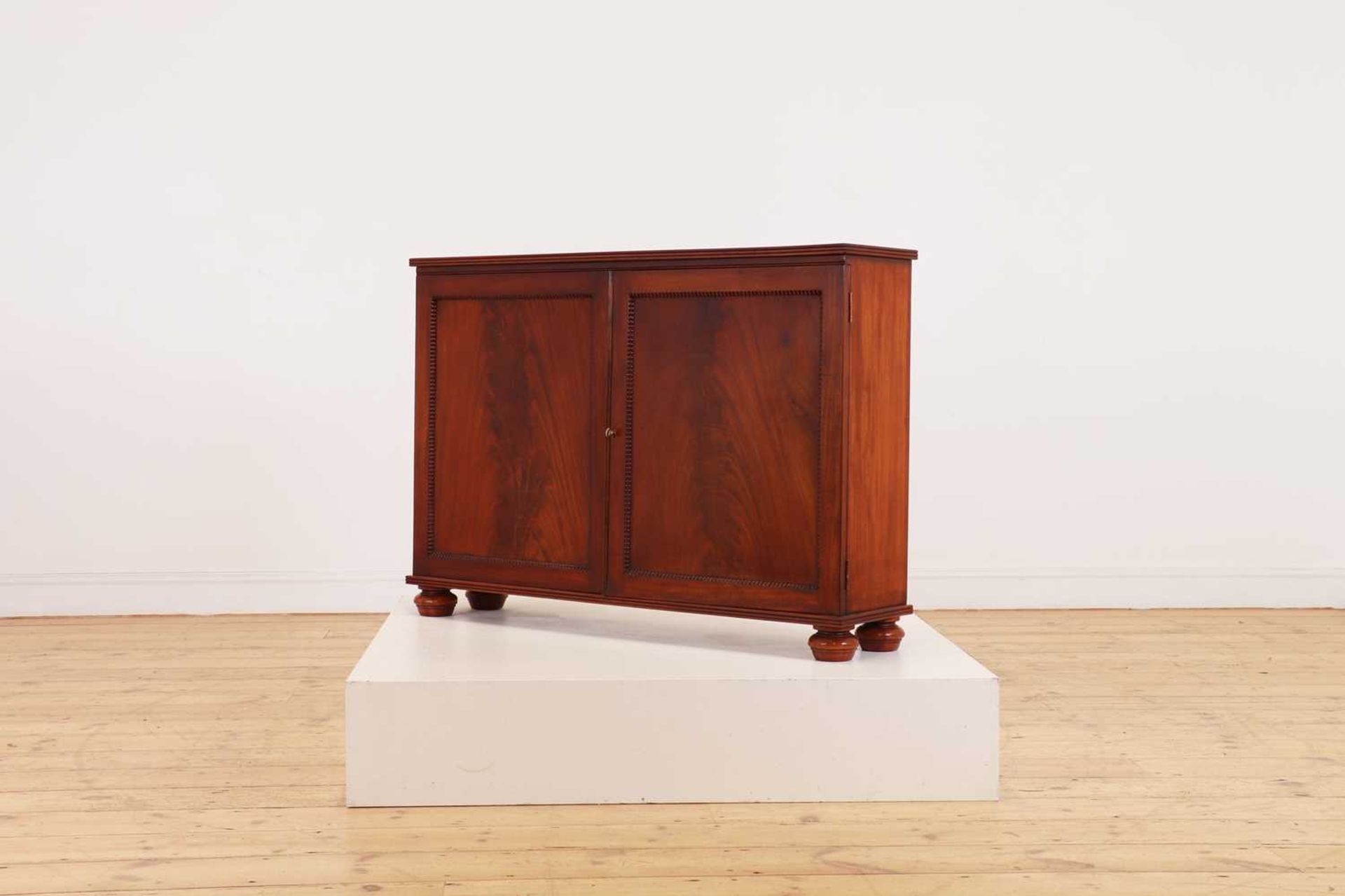 A George IV mahogany wine cooler,