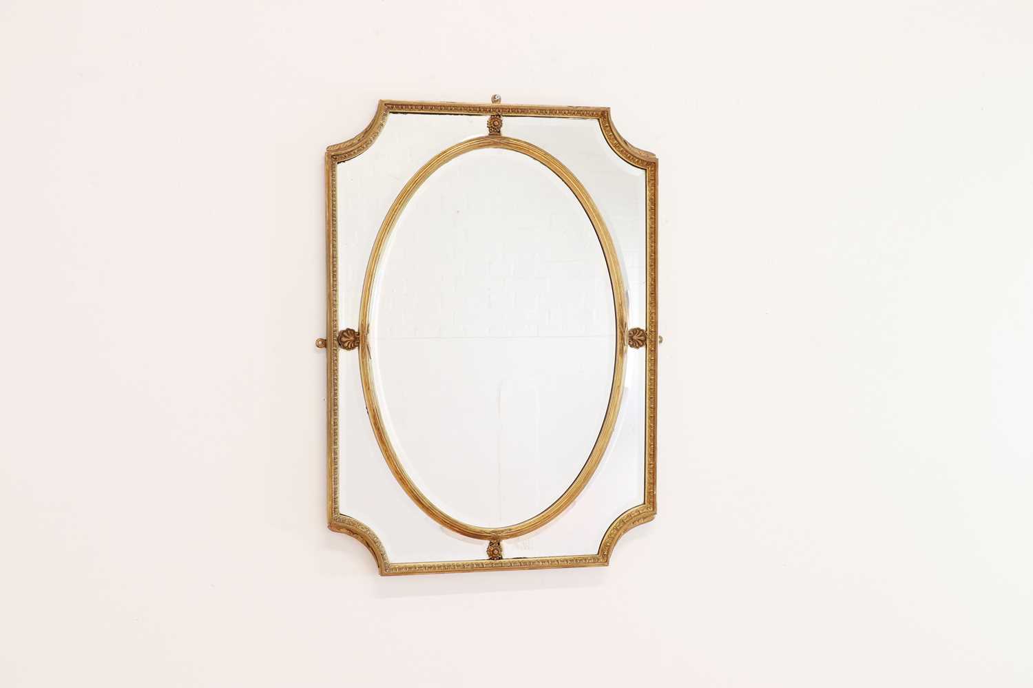 A Louis XVI-style giltwood and gesso mirror,
