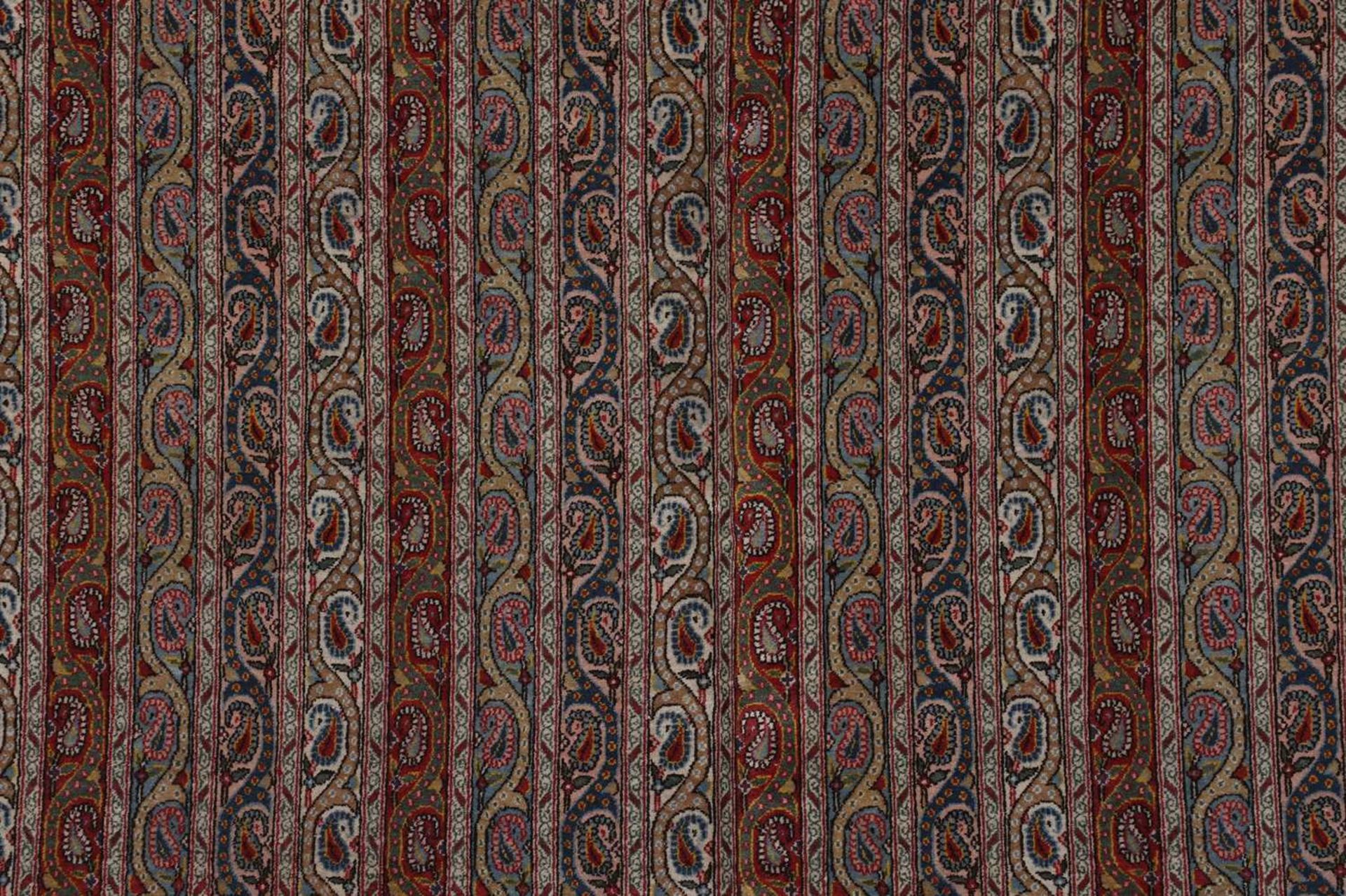 A Persian wool carpet, - Image 3 of 12