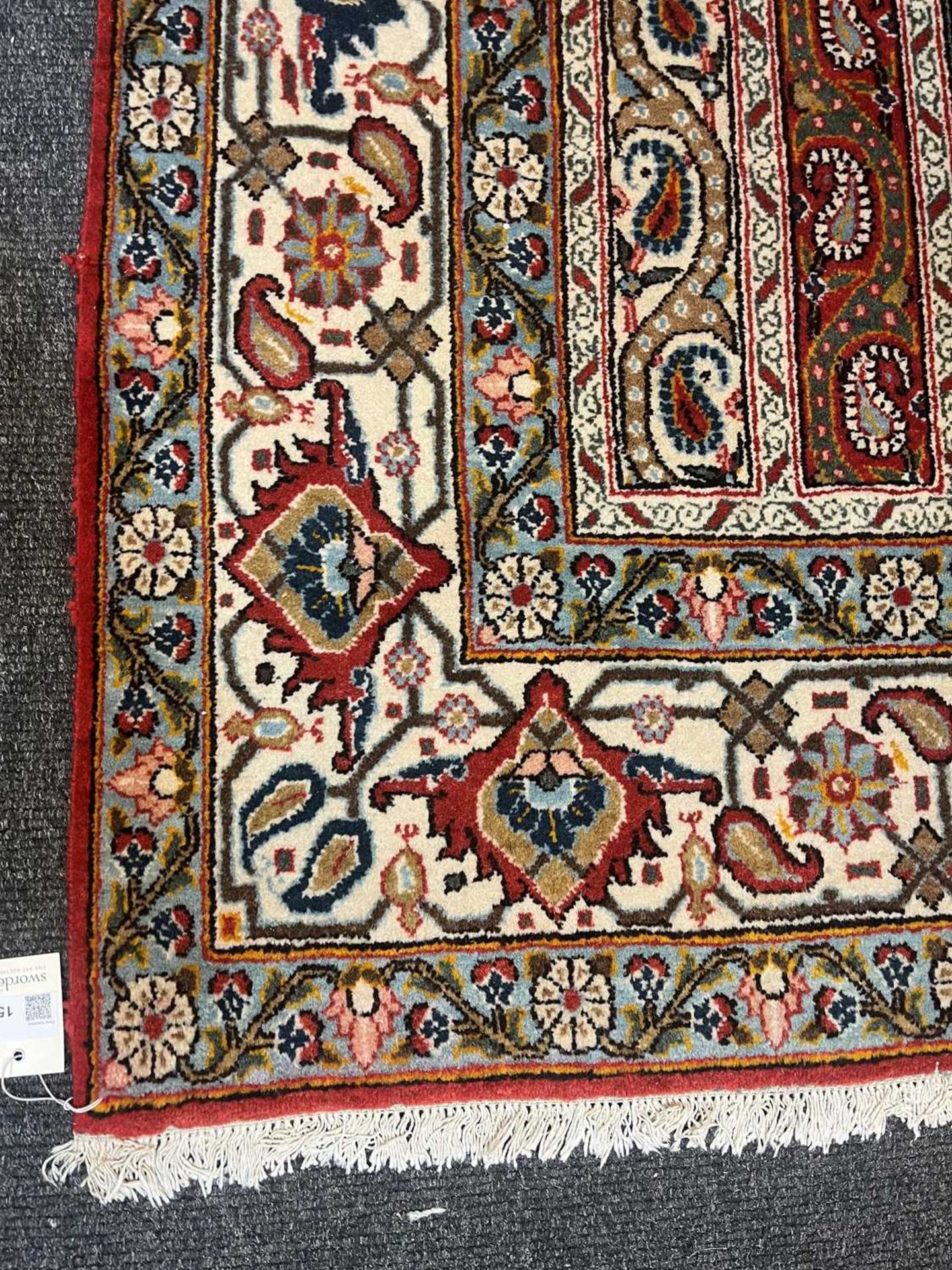 A Persian wool carpet, - Image 8 of 12