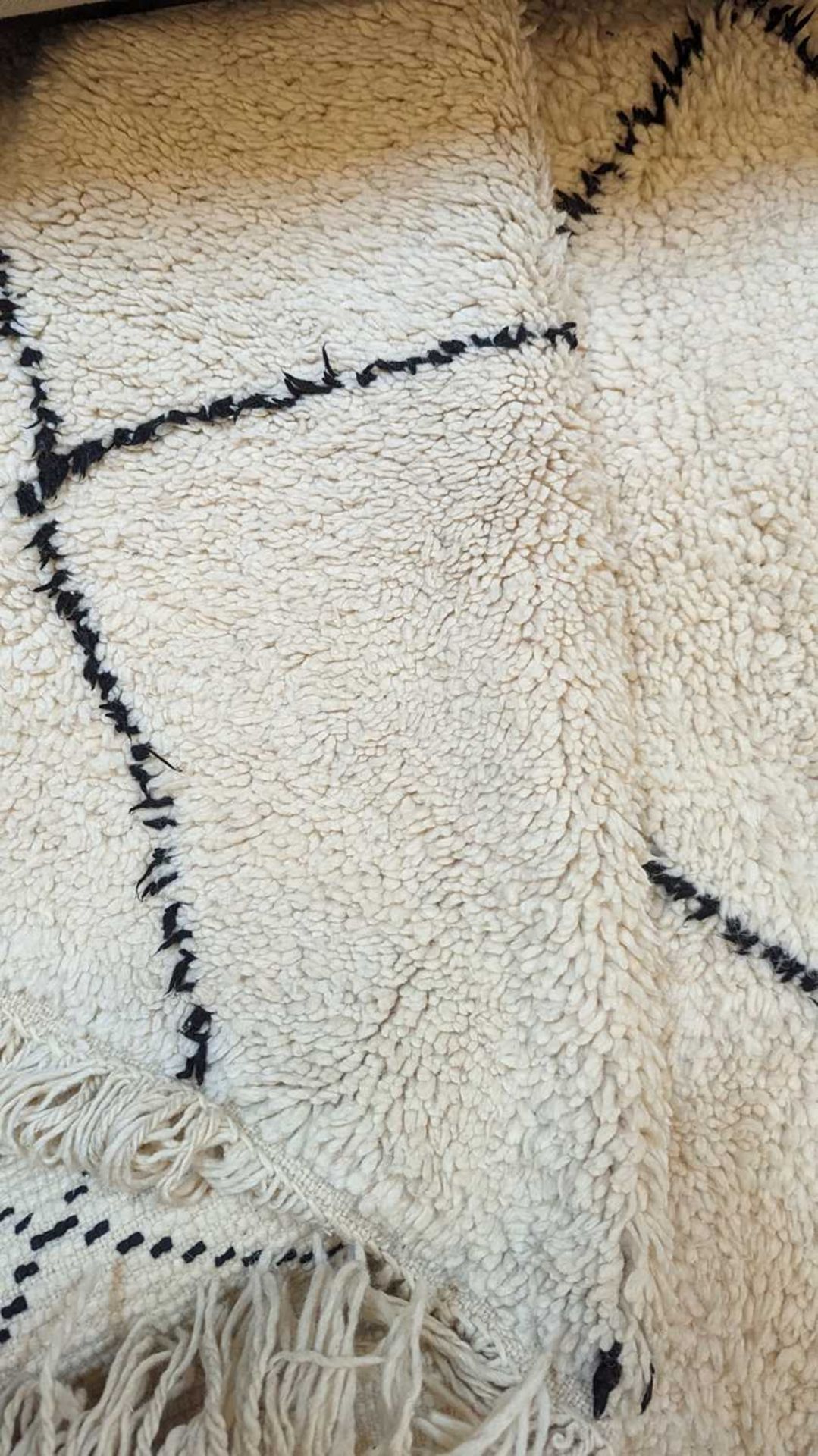 A wool Berber or Beni Ourain rug, - Bild 11 aus 17
