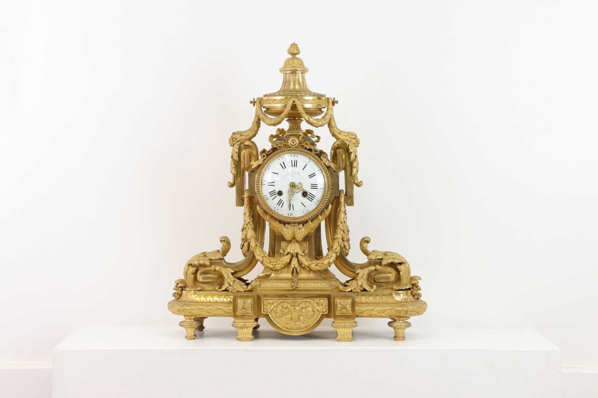 An Empire-style ormolu mantel clock,