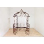 A Victorian-style wrought-iron garden gazebo,