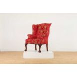 A George I-style wingback armchair,