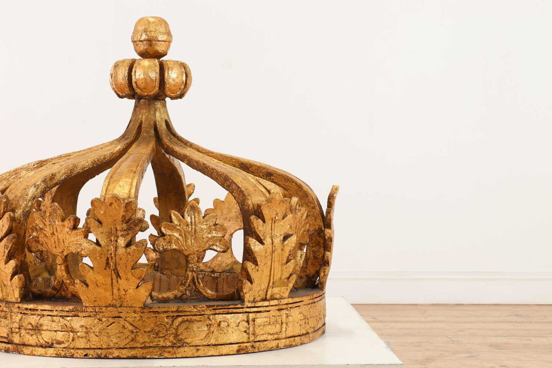 A large carved and giltwood architectural crown,