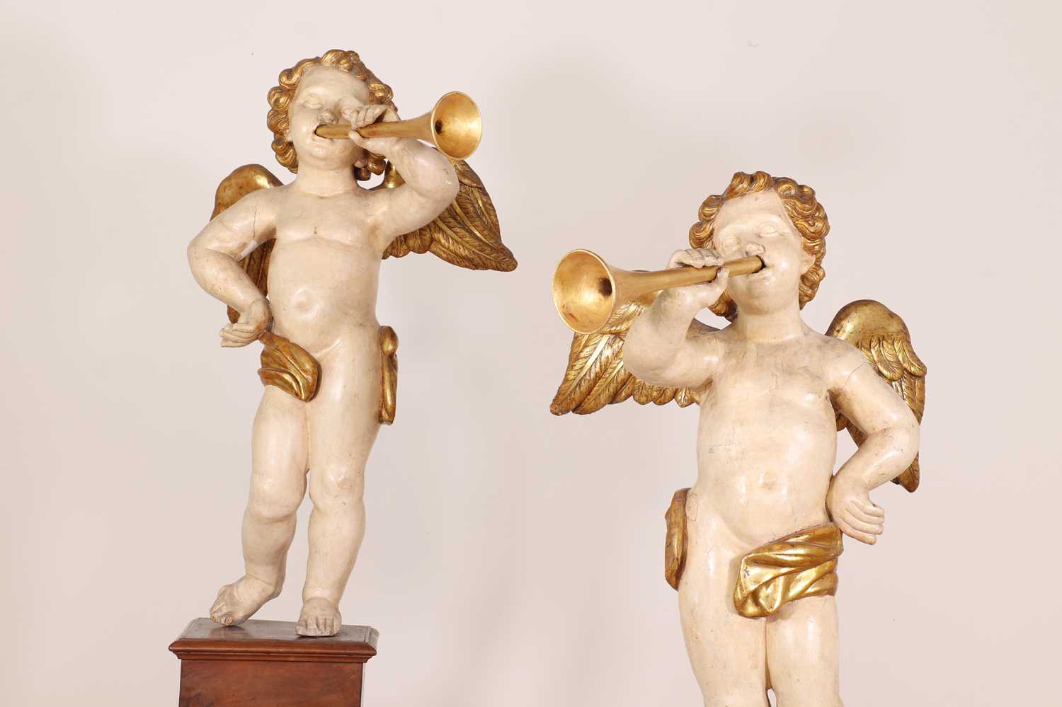 A pair of painted and parcel-gilt wooden putti, - Image 5 of 23