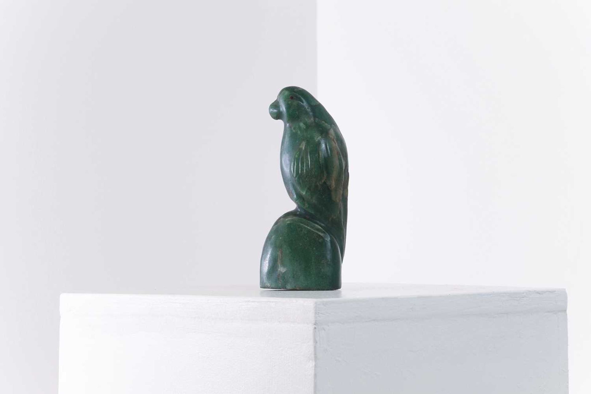 An aventurine quartz carving of a parrot,