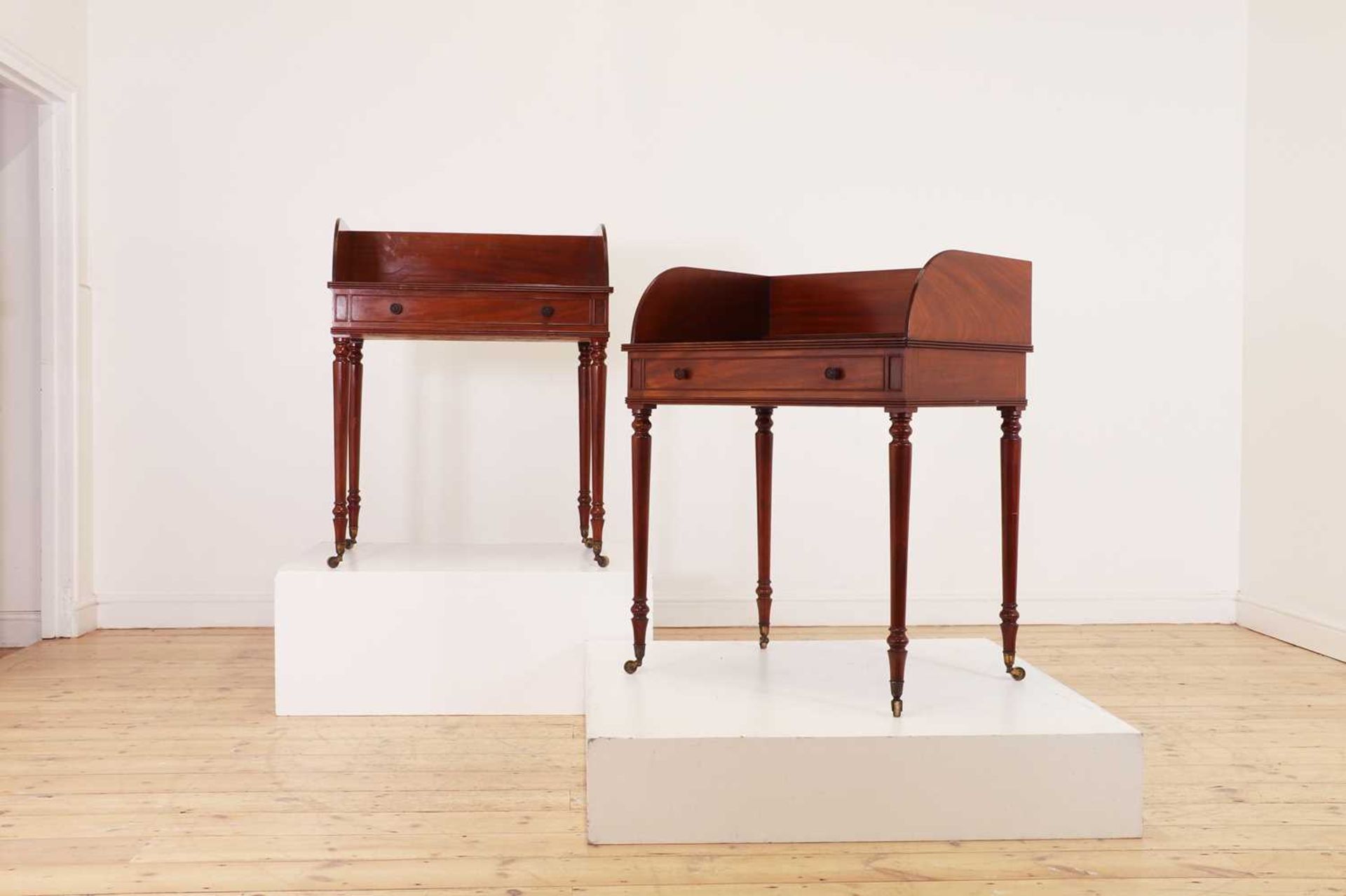 A pair of Regency mahogany washstands in the manner of Gillows,