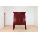 A Chinese red-lacquered marriage cabinet,