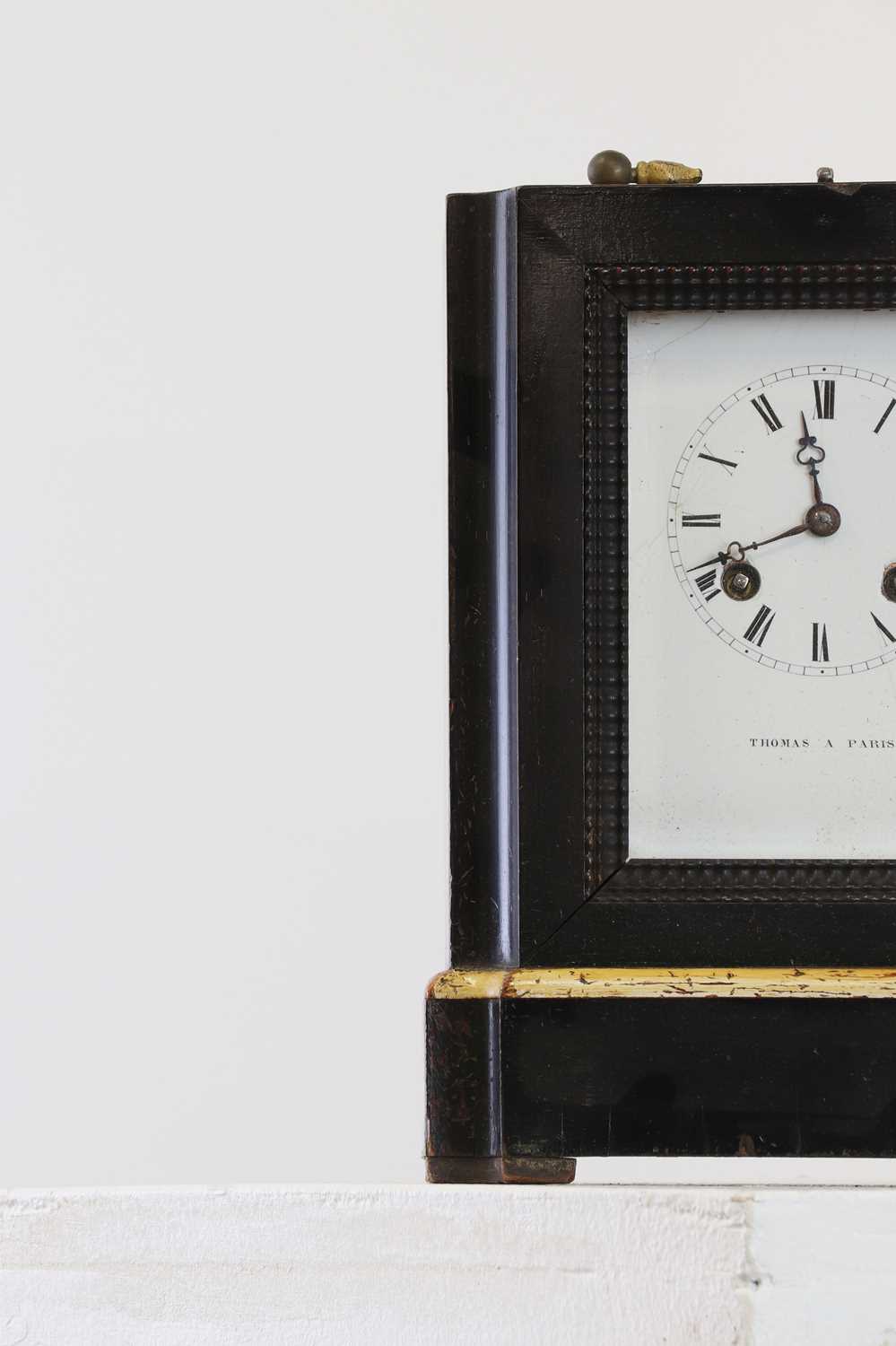 An ebonised and painted table clock, - Image 2 of 4