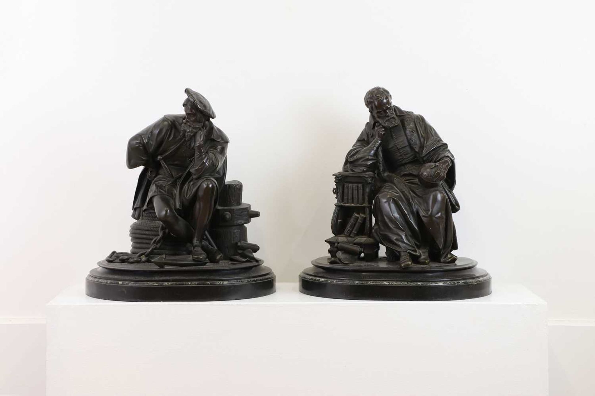 A pair of bronze figures of Columbus and Galileo,