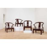 A set of four hardwood low chairs,