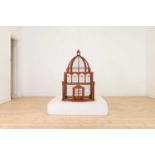 A large-scale hardwood birdcage,