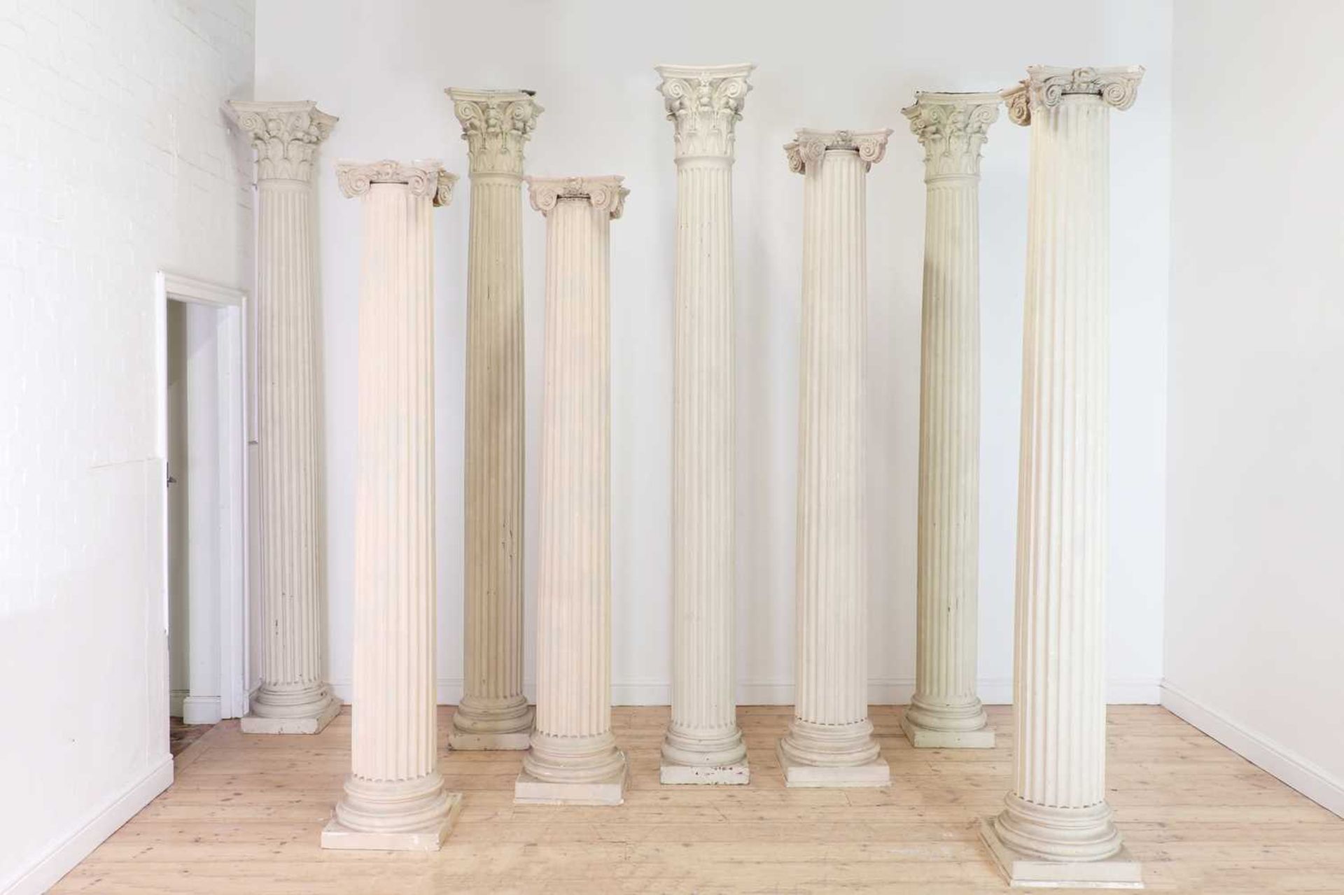 Eight fibreglass classical columns,