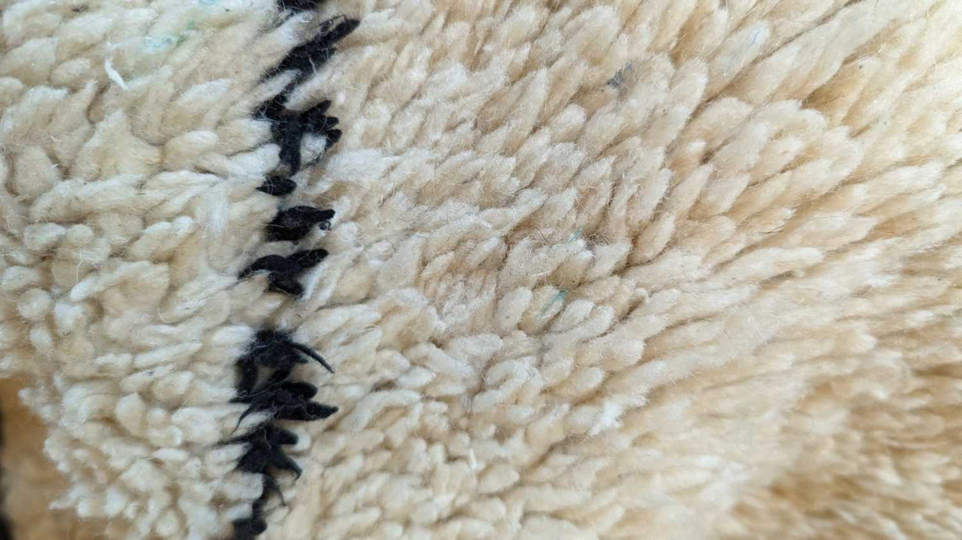 A wool Berber or Beni Ourain rug, - Bild 5 aus 17
