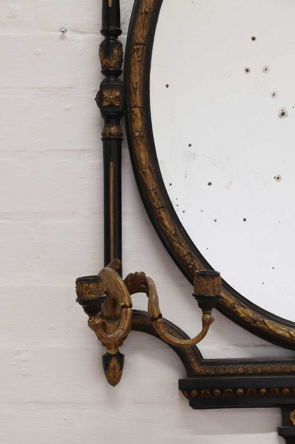 An ebonised and gilt girandole wall mirror, - Image 6 of 7