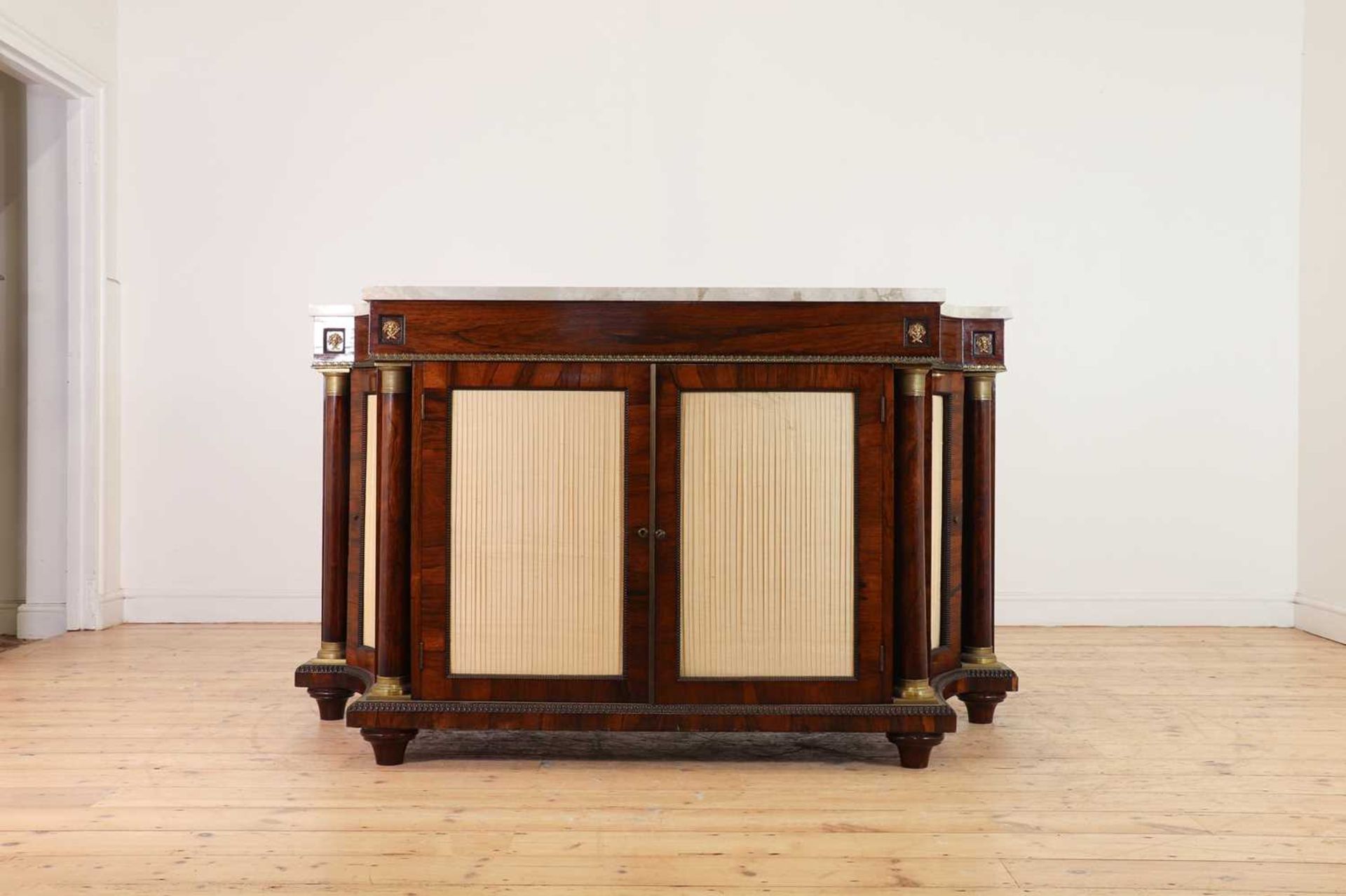 A rosewood and marble-topped side cabinet,