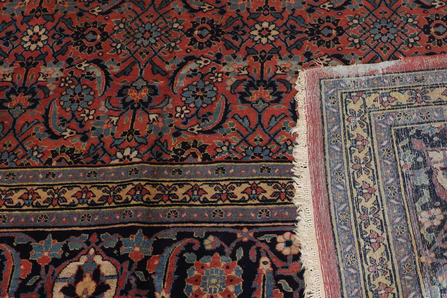 A large wool Persian carpet, - Image 3 of 6