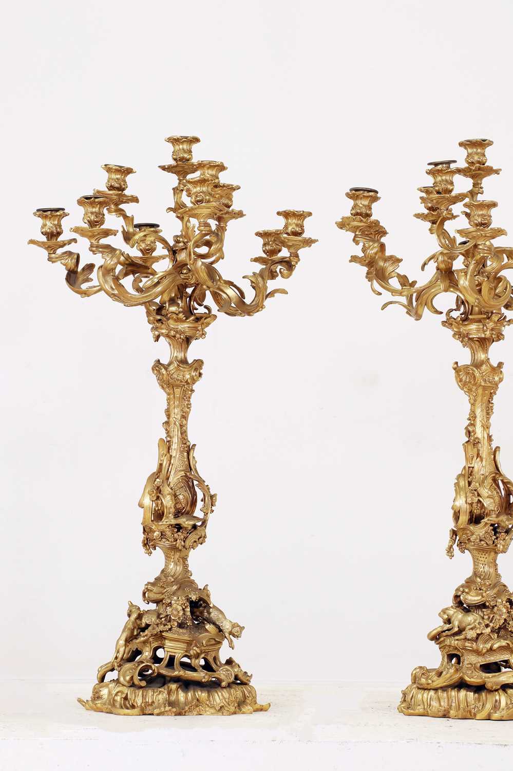 A large pair of Louis XV-style gilt-bronze candelabra,