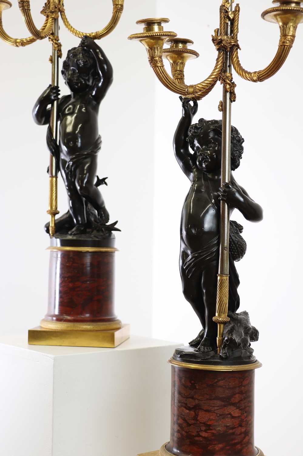A pair of French Empire bronze and marble candelabra attributed to François Rémond (c.1747-1812),
