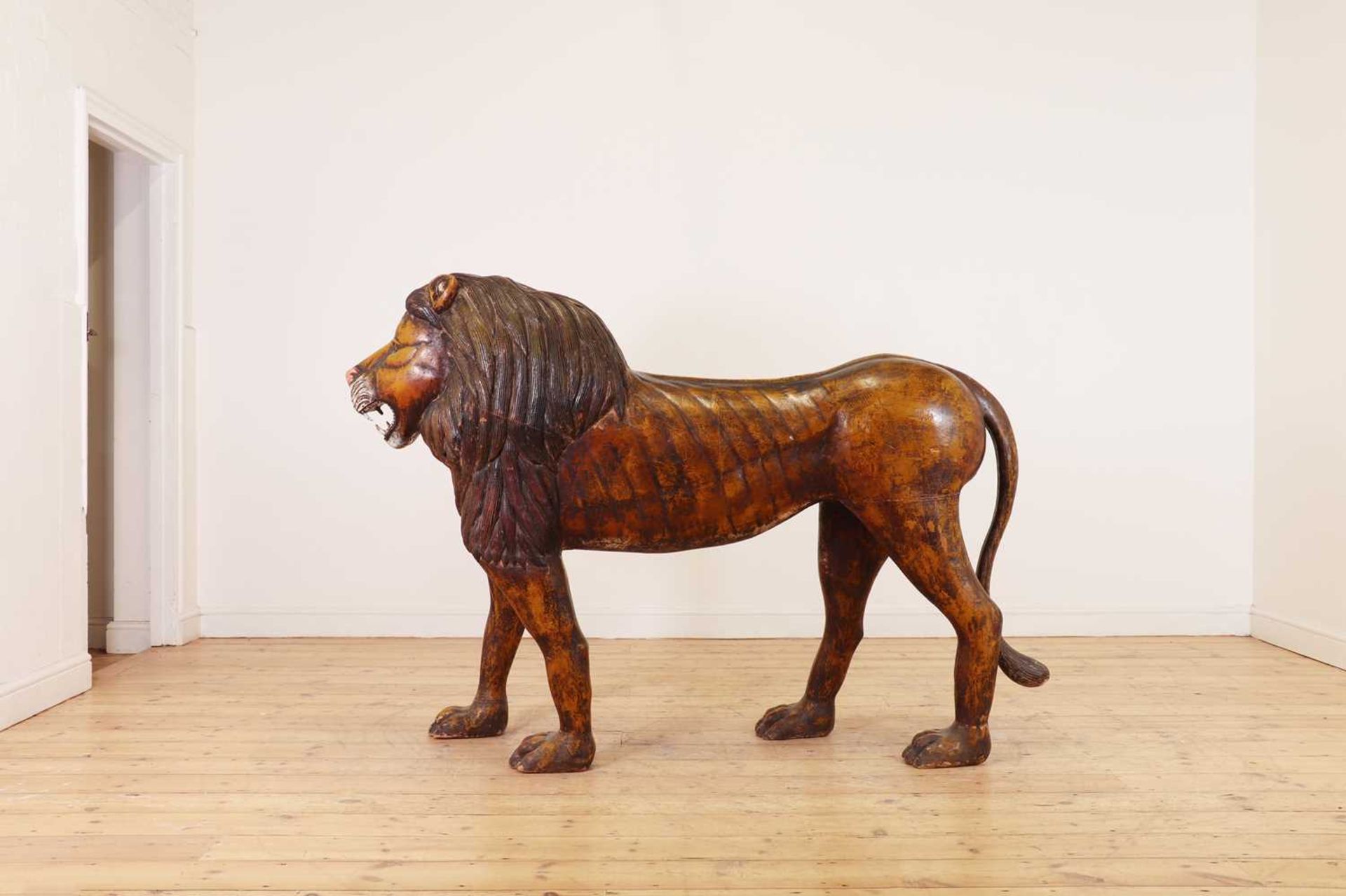 A large painted pine lion,