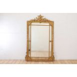 A Louis XVI-style giltwood and gesso overmantel mirror,