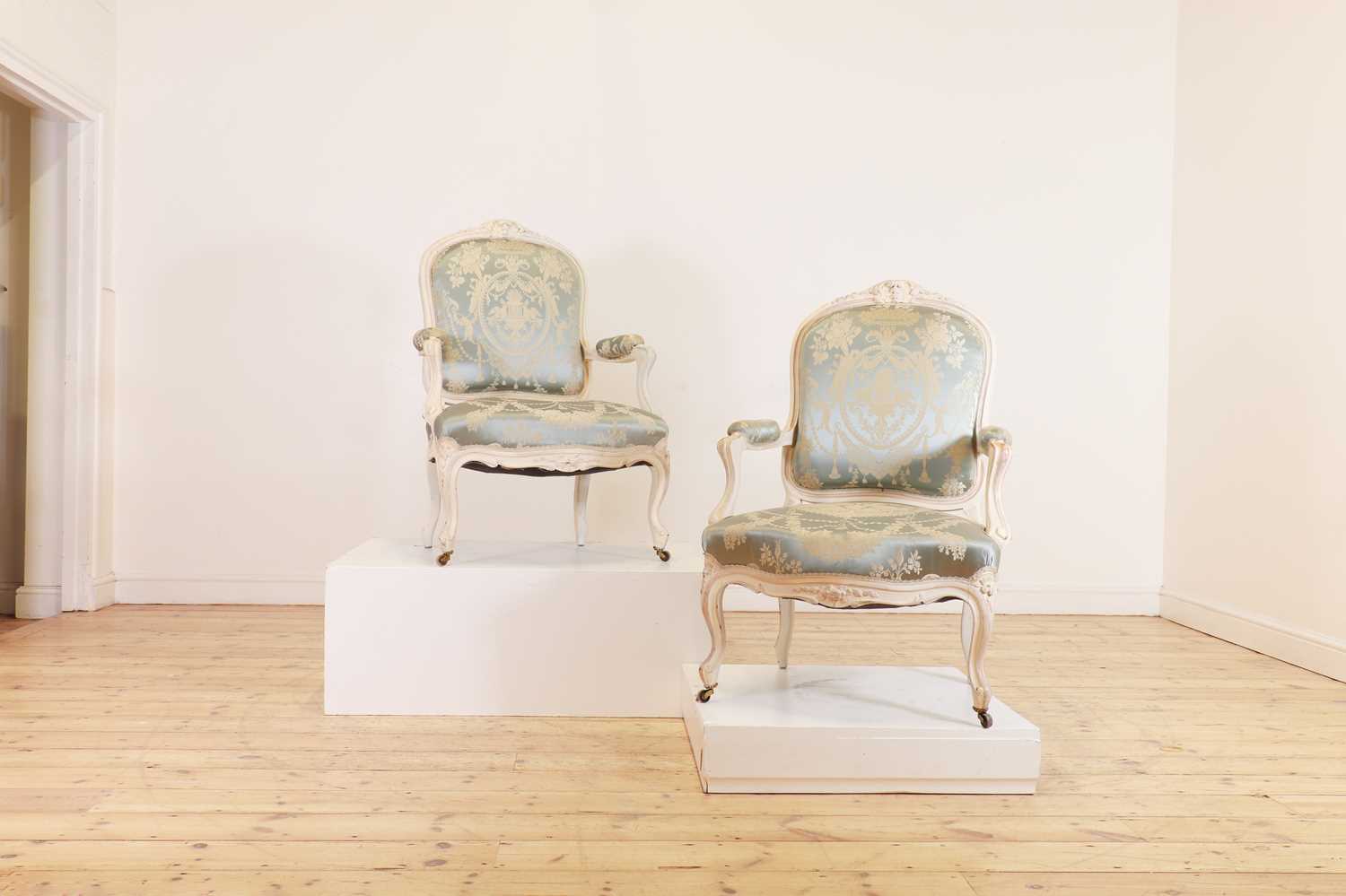 A pair of Louis XVI-style painted fauteuils