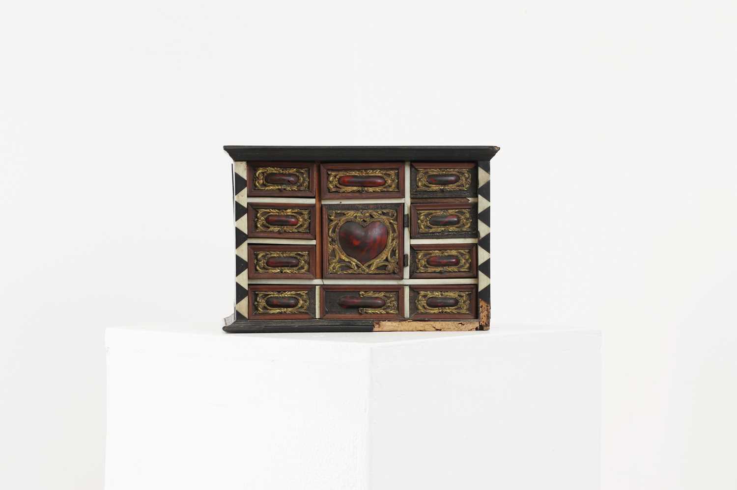 A bone and tortoiseshell inlaid table cabinet,